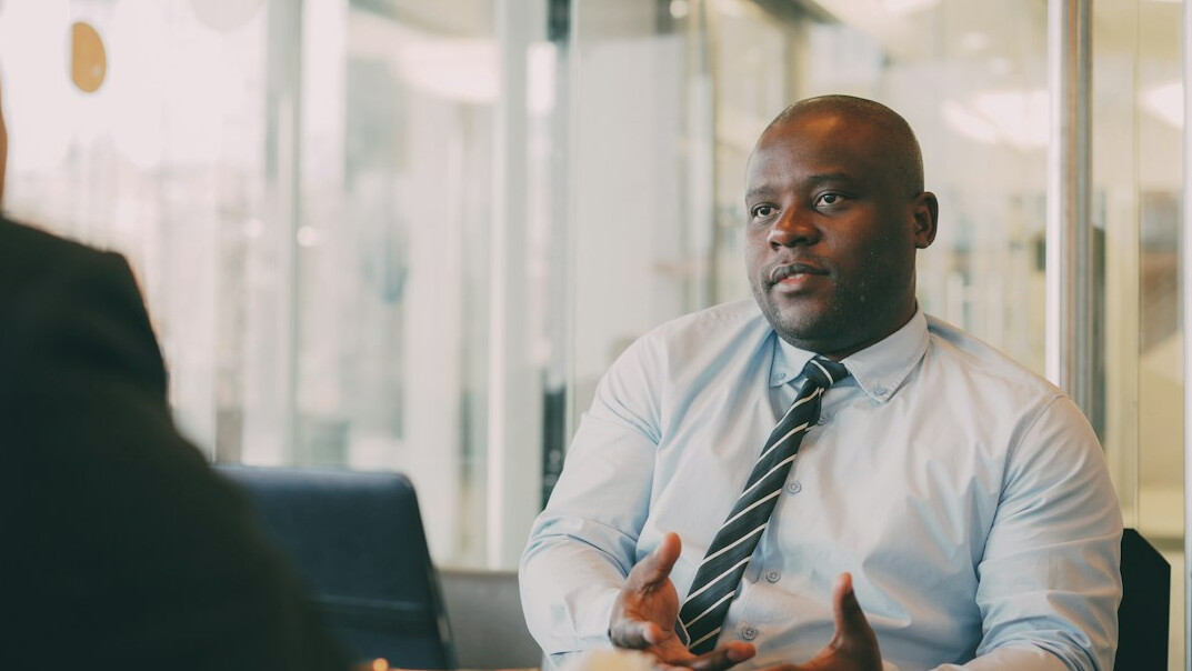 confident man leading discussion